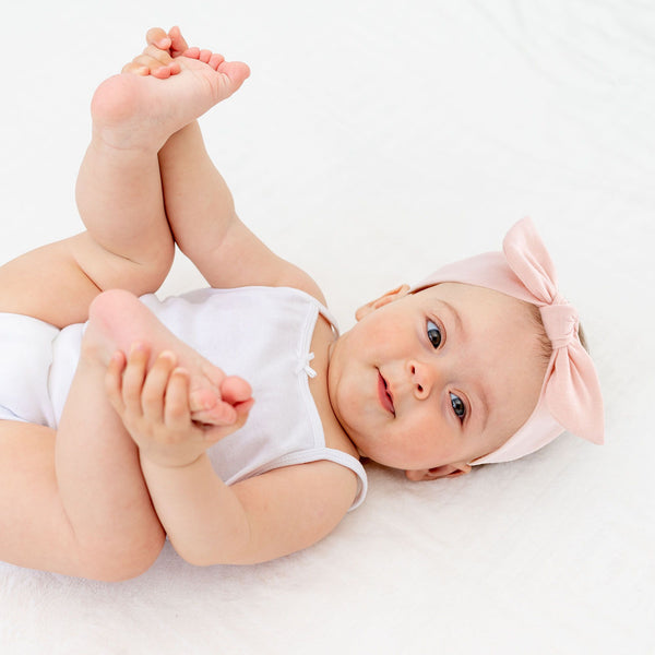 Parsa Beauty PARSA Baby Haarband rosa mit Schleife 1Stk Kauf eins, bekomm eins gratis